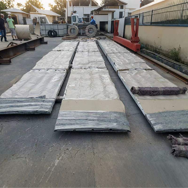 बिल्डिंग एनक्लोजर कलर स्टील प्लेट म्हणजे काय आणि आधुनिक औद्योगिक इमारतींसाठी ते का आवश्यक आहे